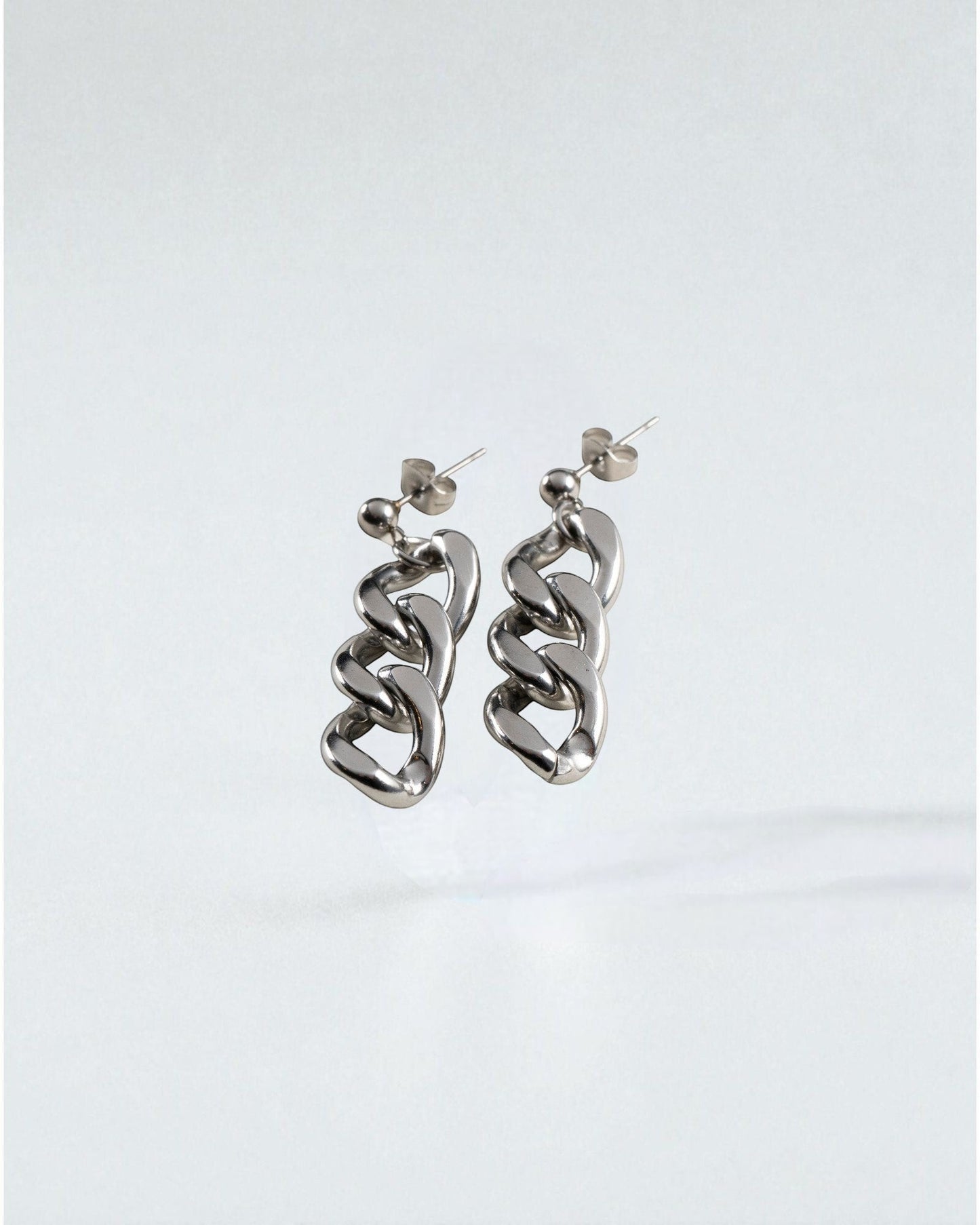 Odonata silver-tone stainless steel chain link drop earrings with butterfly closure, 4cm length.