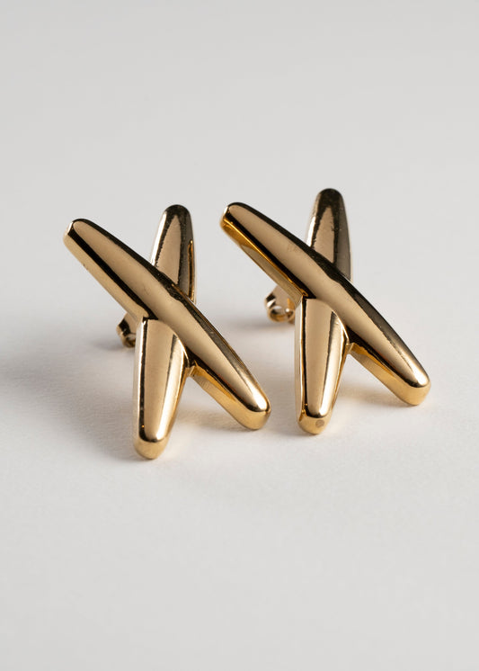 Aretes Tache