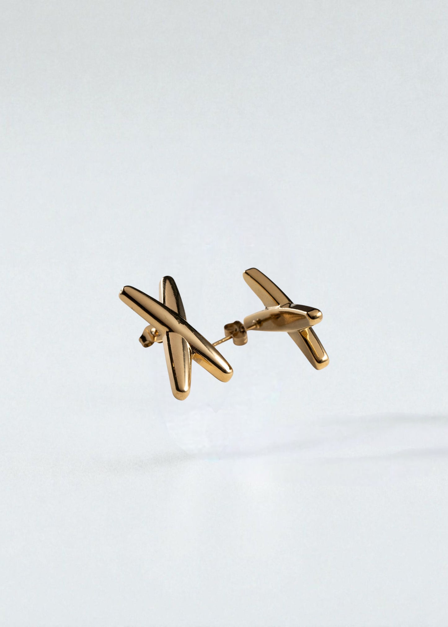 Aretes Tache