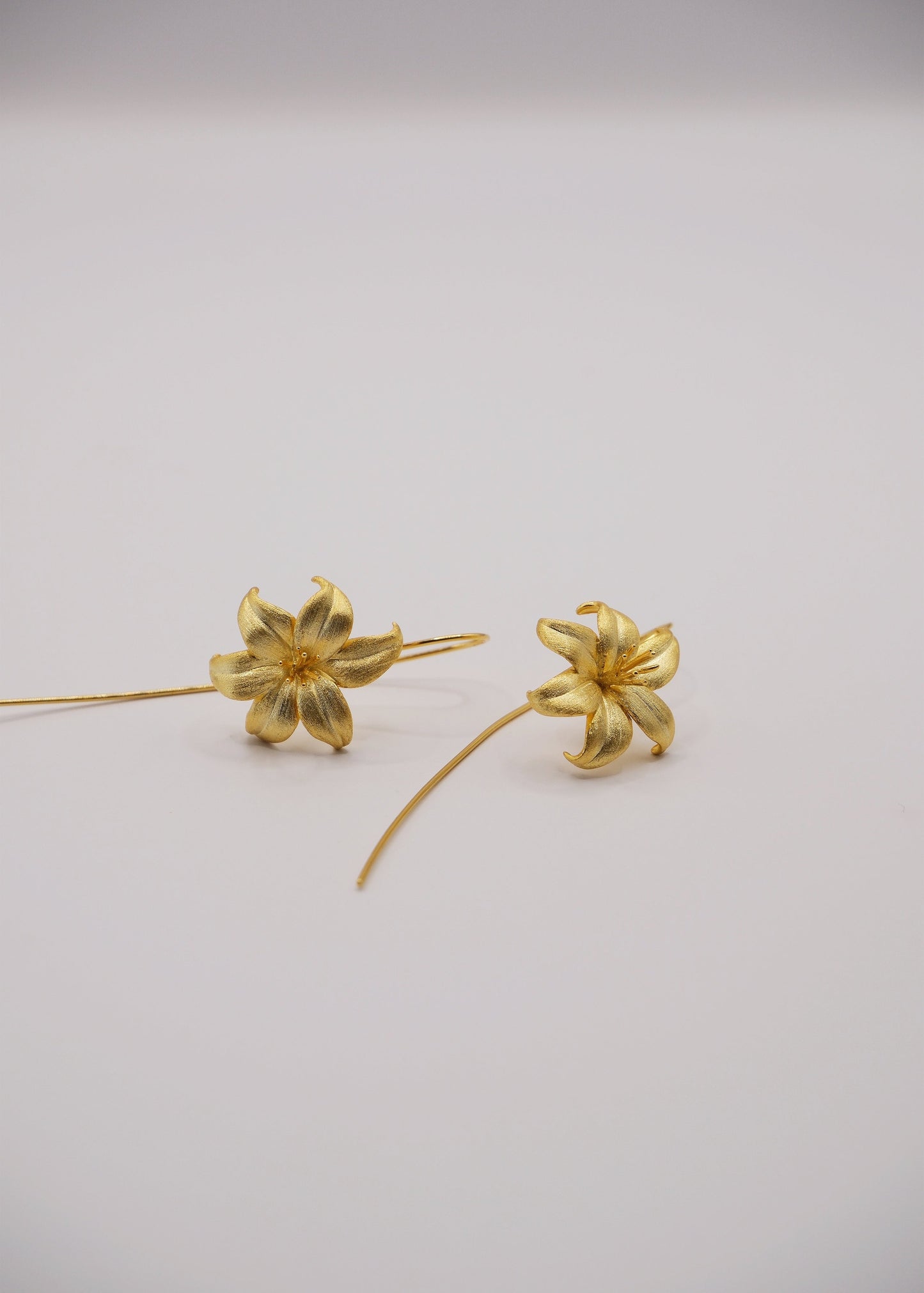 Aretes Flor de Oro