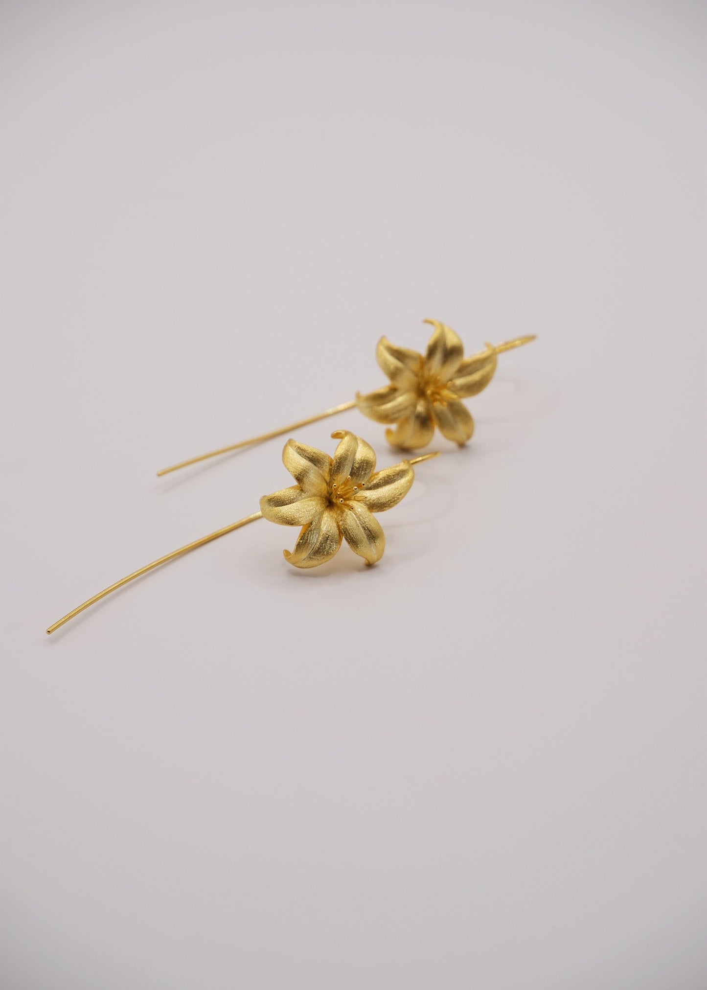 Aretes Flor de Oro
