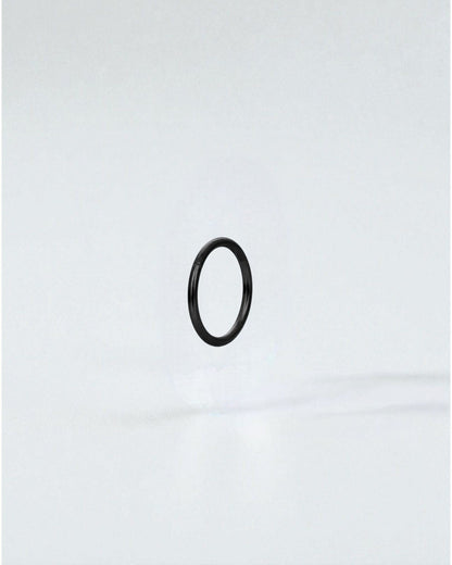 Odonata black stainless steel clicker hoop earring, 10mm inner diameter, ideal for a minimalist look.