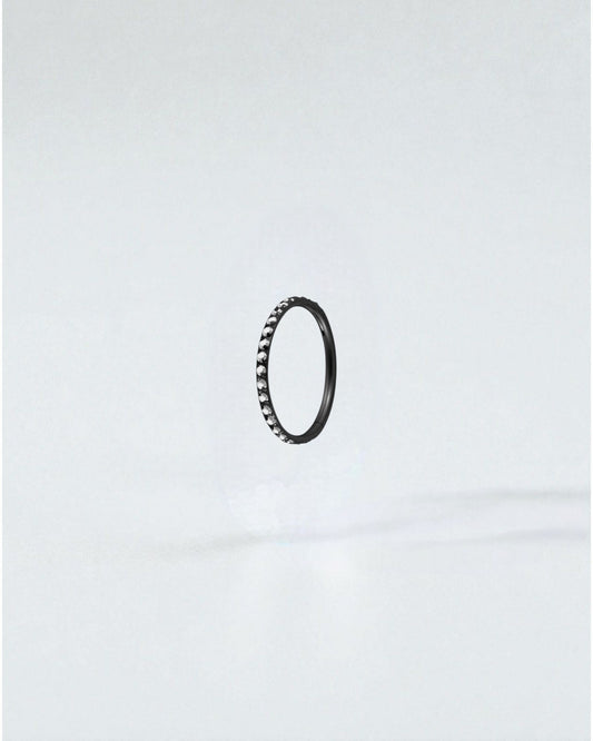 Odonata black titanium clicker hoop earring with clear crystals, 6mm diameter, 18g.