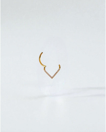 Odonata gold and silver clicker earrings with V-shaped design and white cubic zirconia stones, 8mm diameter.