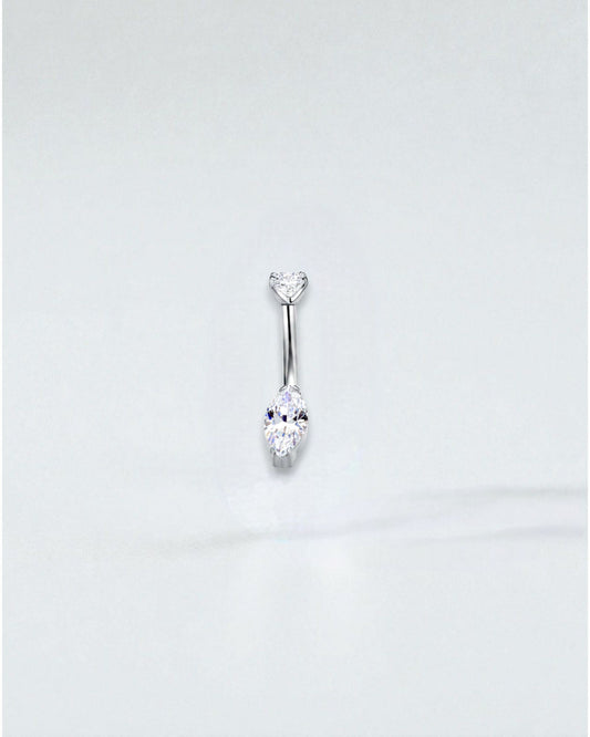 Odonata gold titanium belly button piercing with a round cubic zirconia top and a marquise-cut cubic zirconia drop.