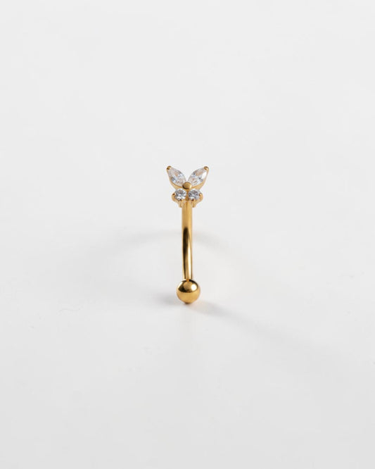 Odonata gold titanium eyebrow ring with butterfly design featuring clear cubic zirconia. Internal thread closure.