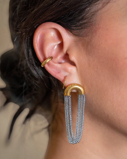Odonata gold-plated stainless steel earrings with cascading silver chains. Elegant drop earrings with a sophisticated design.