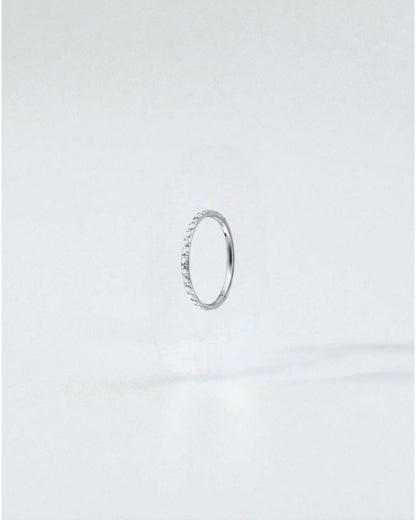 Odonata gold titanium clicker hoop earring with clear cubic zirconia stones, 8mm diameter.