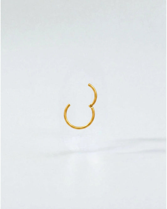 Odonata gold-plated stainless steel 8mm clicker hoop earring with a clean, minimalist design.