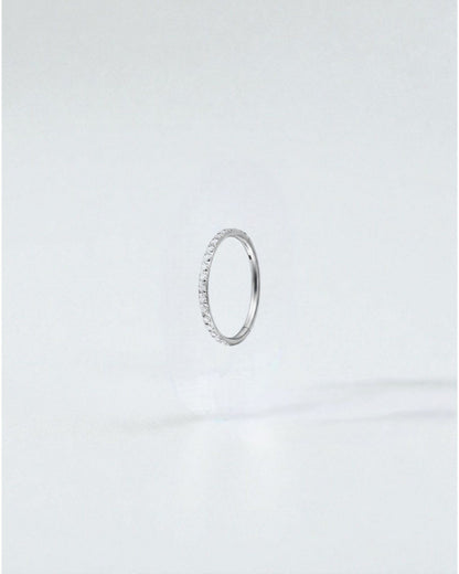 Odonata gold titanium clicker hoop earring with clear cubic zirconia gems, 6mm diameter.
