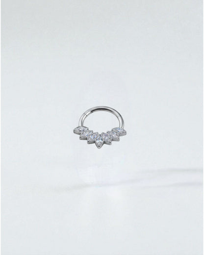 Odonata gold titanium clicker septum or daith piercing with marquise-cut clear cubic zirconia stones arranged in a fan shape.