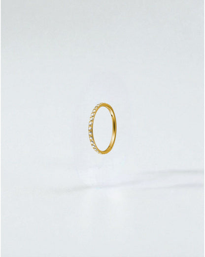 Odonata gold titanium clicker ring with clear crystals, 6mm diameter, 18g gauge.