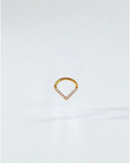 Odonata gold-tone titanium clicker earring with V-shaped white cubic zirconia stones, 8mm inner diameter.