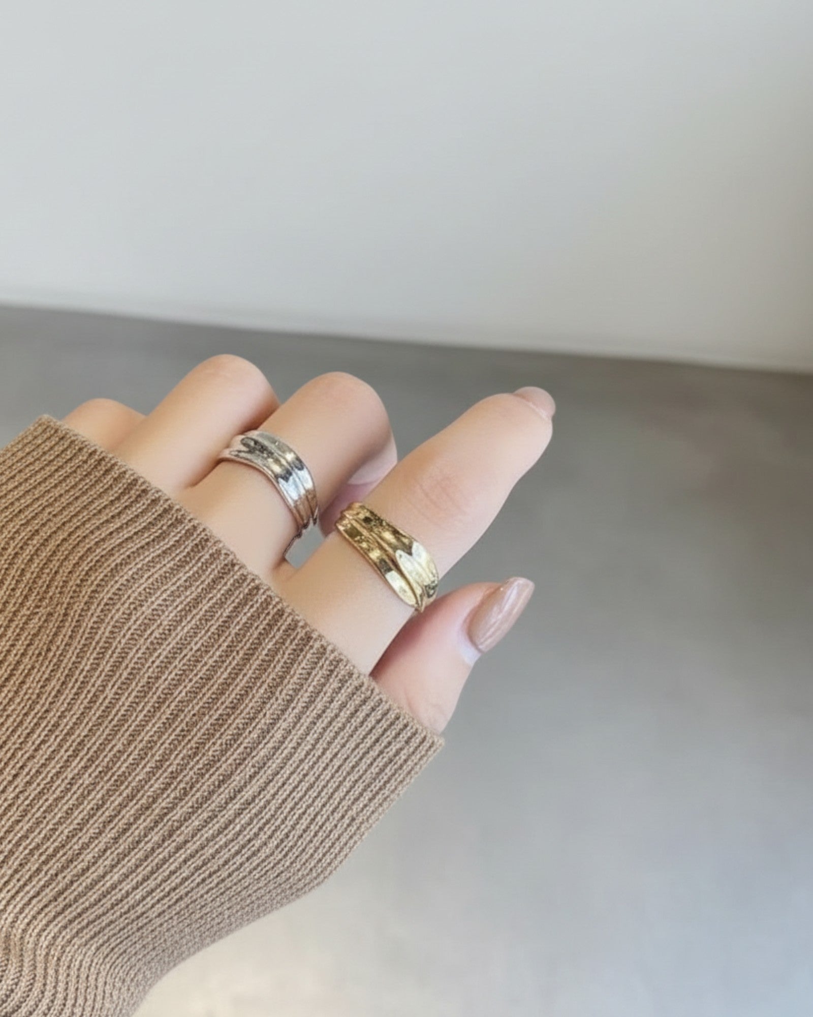 Odonata organic wave design adjustable rings in polished silver and 18k gold plated sterling silver.