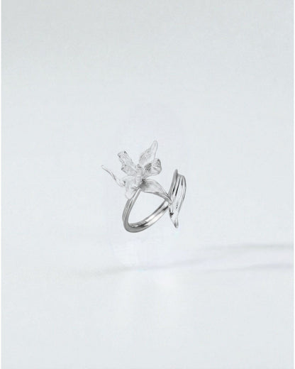 Odonata sculpted flower ring in matte sterling silver with double band, adjustable size.