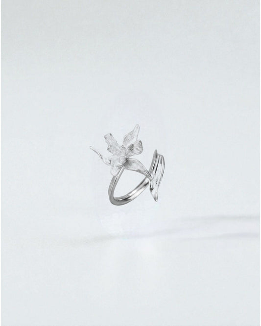 Odonata sculpted flower ring in matte sterling silver with double band, adjustable size.