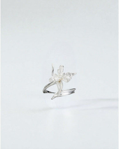 Odonata sculpted silver flower ring with double open band, matte finish, and detailed petals.