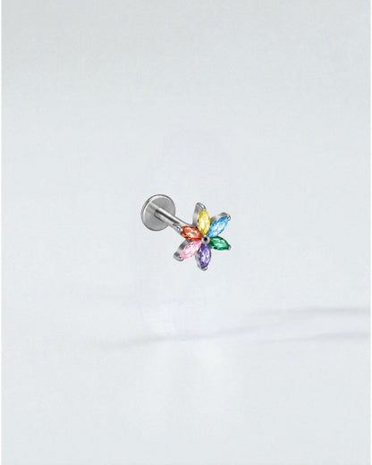 Odonata Stud de titanio plateado con diseño de flor de circonias multicolor y poste flat back.