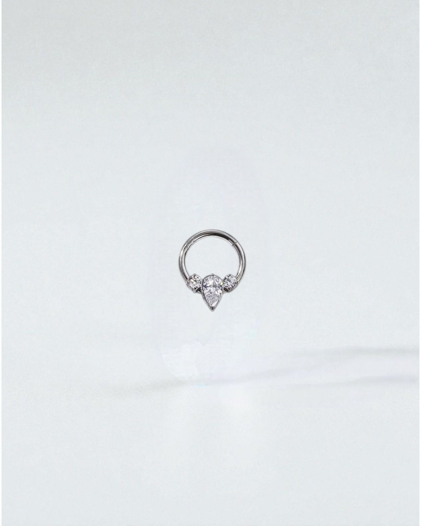 Odonata Clicker Diamante Triple implant-grade titanium septum rings with clear cubic zirconia gems in various designs.