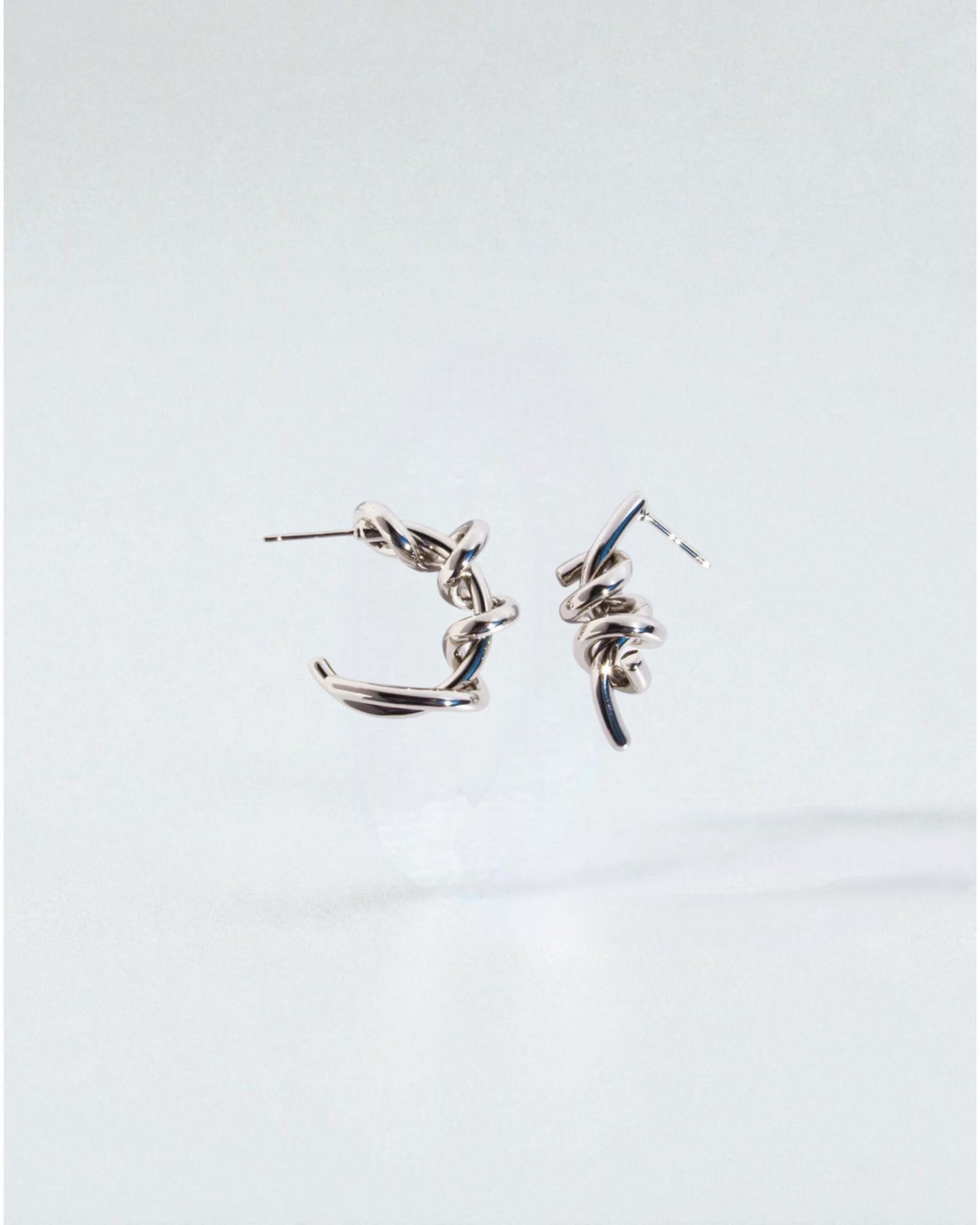 Odonata silver-tone twisted hoop earrings, 2.4cm, made of 24k gold-plated brass.