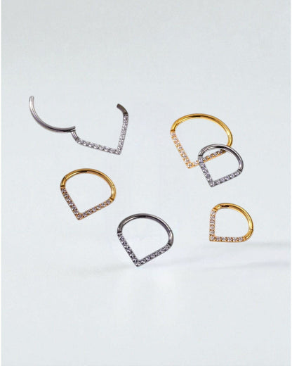 Odonata gold and silver clicker earrings with V-shaped design and white cubic zirconia, 8mm diameter.